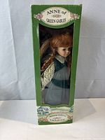 Front view of boxed Anne of Green Gables porcelain doll