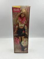 Front view of sealed Barbie Really Rosy doll box