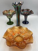 Group shot showing cobalt vase, orange dish, green-stem and cobalt-stem compotes