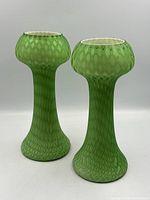 Pair of green satin glass vases front view