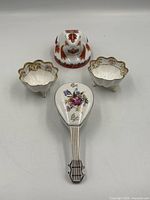 Group shot of all four porcelain items