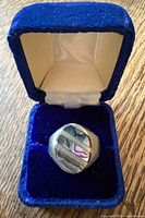 Ring in blue velvet box, lid open, showing abalone inlay