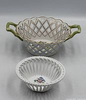 Both Herend reticulated baskets side by side