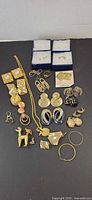 All jewellery pieces laid out to show variety and condition