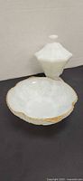 Bowl and lidded pedestal candy dish side by side
