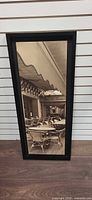 Front view of framed Paris café print