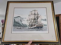 Full view of framed etching showing artwork, mat and frame