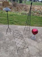 all four garden decor items on patio