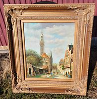 Front view of framed oil painting