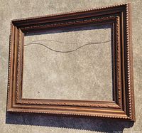 front view of large wooden picture frame