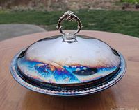 Covered dish showing lid and handle