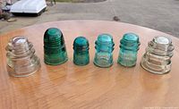 All six glass insulators lined up for full view