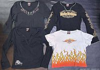 Overview of four Harley-Davidson women’s T-shirts.