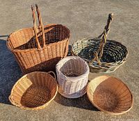 all five baskets grouped on pavement