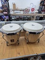 Front view of connected LP Aspire bongos showing both drums and hardware