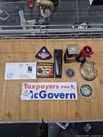 Overview of all ten items arranged on wooden surface