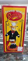 Front of box displaying Rudolph dancing figure