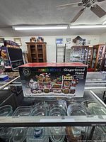 Front of boxed Puleo Fiber Optic Gingerbread Train showing product image