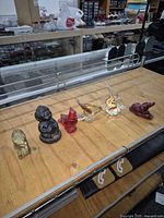 All six figurines arranged on table