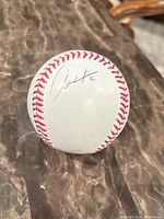 Autograph of Aaron Hill on baseball panel