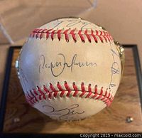 Autographed baseball showing Roberto Alomar signature