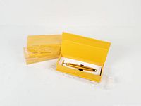 Three boxed Energy Beauty Bar facial massagers, one opened to show contents