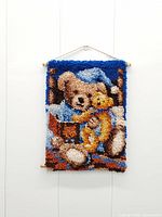 Full view of latch hook wall tapestry hanging