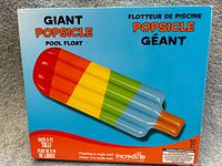 Front of unopened box showing popsicle float image and branding