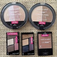 Front view of all five sealed Wet n Wild makeup items