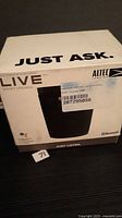 Front view of sealed Altec Lansing LIVE smart speaker retail box