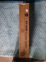 Front view of sealed KY-8000 soundbar retail box