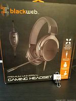 Front of sealed Blackweb Premium Universal Gaming Headset box