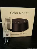 Front of sealed box showing Color Noise white noise machine