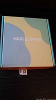 Closed retail box labeled HAIR CLIPPER