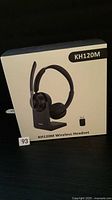 Front of sealed KH120M headset box showing product image and model