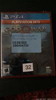 Front of sealed PS4 God of War PlayStation Hits game