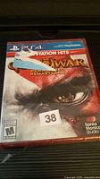 Front of sealed PS4 God of War III Remastered case