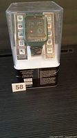 Front view of sealed Teenage Mutant Ninja Turtles interactive watch in retail cube