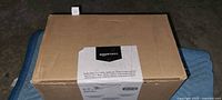 Sealed Amazon Basics shipping carton