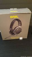 Front of sealed onn gaming headset box