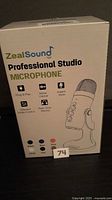 Front of sealed ZealSound Professional Studio Microphone retail box
