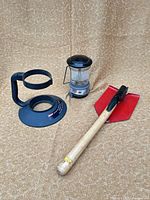 Lantern, cylinder base and folding shovel full lot overview