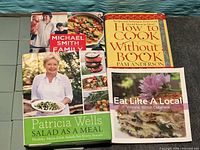 Group shot of four cookbooks showing all titles and covers