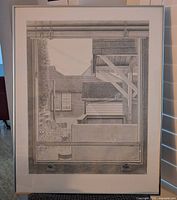 Front view of framed pencil drawing showing subject and frame
