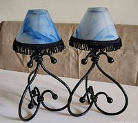 both assembled candle holders with shades in place