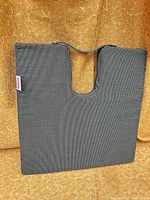 Front view showing U-shaped cutout and handle