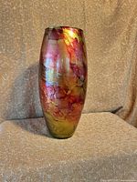 Full view of burgundy and gold glass vase front