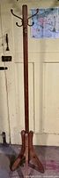 Full view of wooden hall tree coat rack stand