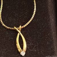 Full view of pendant and section of chain