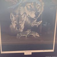 Full view of framed print showing wolf imagery, mat and frame